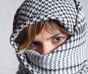 The young beautiful girl with a scarf 