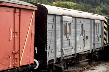 Obraz premium Historic railway carriages on the siding of a preserved railway