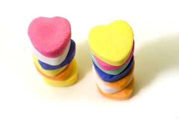 2 stacks of Valentine Candy Hearts