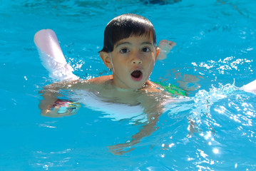 Boy having fun in the swimming pool