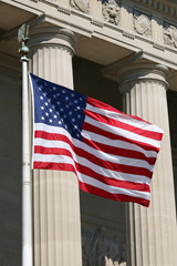 USA flag against ionic columns, Washington DC