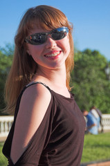 The young beautiful dared girl in sunglasses