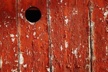 Door with a peep hole painted in red