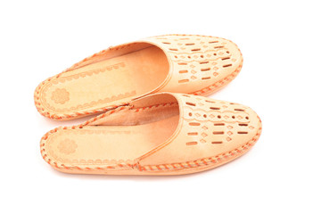 pair of leather clogs isolated on white