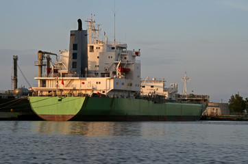 old oil tanker in dock