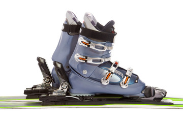 Modern ski and boot isolated on white background