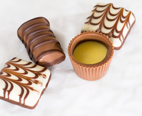 Delicious chocolate on white background