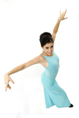 Fototapeta premium Portrait of young beautiful hispanic dancer girl isolated
