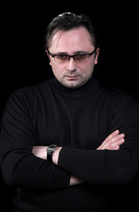 Fototapeta premium Emotional the man on a black background