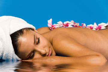 Beautiful woman on massage table