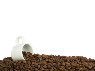 coffee beans and an espresso cup with copy-space at top