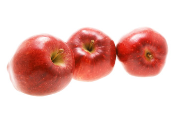 Fototapeta na wymiar Three red apples on strong white background