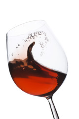 Isolated moving (motion blur) red wine glass