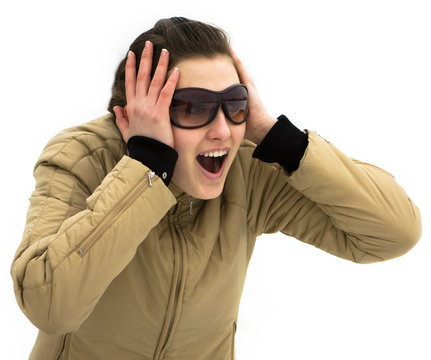 Young Girl Holding Her Head In Awe