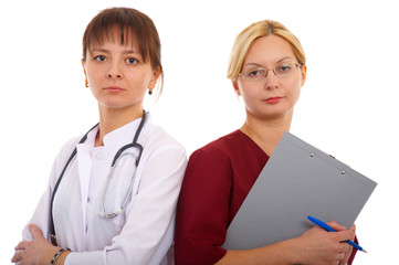 female doctor and nurse in glasses with medical accesories