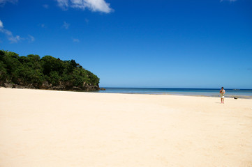 Walking on a deserted beach