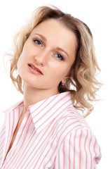 Fototapeta premium Portrait of blonde girl in pink dress on white background