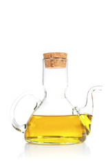 Extra virgin olive oil reflected on white background