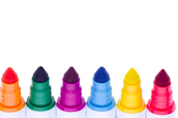 row of colourful marker pens with copyspace