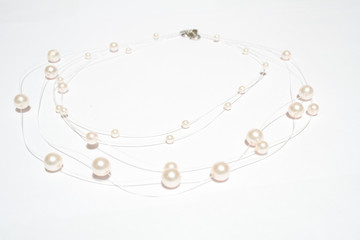 pearl necklace on white isolated background