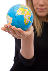businesswoman holding a mini globe for communications
