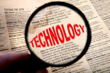 Newspaper with magnifying glass