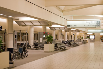 Airport termical interior with gates and waiting area - 6215846