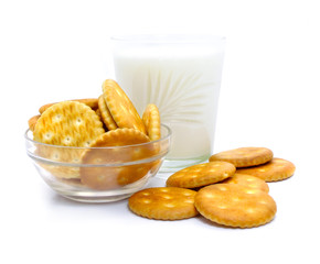 Salt crackers and milk food in the glass vase isolated 