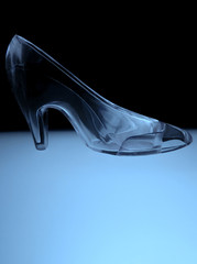 an illuminated glass slipper in cool blue tones