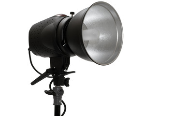 Modern powerful photographic flash on a white background