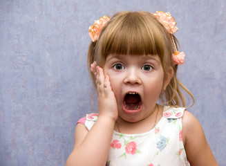 portrait child with brightly expressed emotion