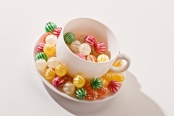 food serias: cup with striped sugar candy