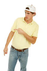 Young college age man pointing off camera in disgust 