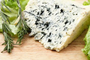 Blue cheese on wood board