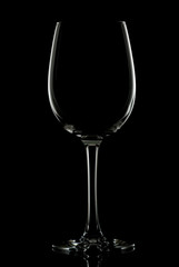 Silhouette of red wine glass  - isolated on black.