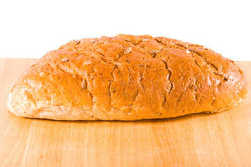 Loaf of Bread on Bread Board