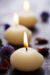 row of  candles on wooden surface