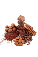 stack of chocolates and cocoa isolated on white