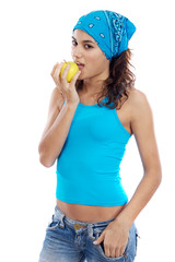 Beautiful woman eating apple a over white background