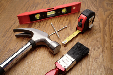Tools on wooden panel