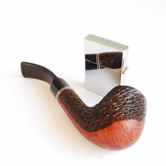 tobacco-pipe and cigarette-lighter on a white background