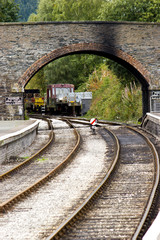 Obraz premium A bridge over the tracks of a preserved Vctorian railway