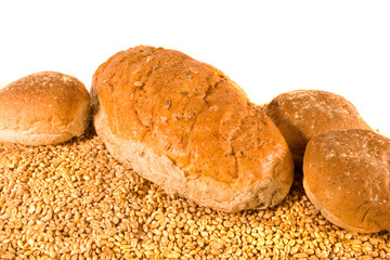 Wholemeal Rolls and Loaf on Wheat Grains