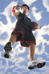 Young, confident and smiling basketball player