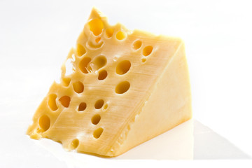 Piece of cheese on a white background