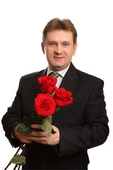Portrait of a man with a bouquet in the hands