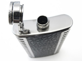metallic open flask against the white background