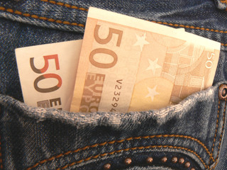 Money in pocket jeans. 100 euro