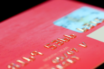 Close-up credit card on a black background