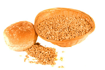 Bread Roll and Wheat Grains spilling from Whicker Basket